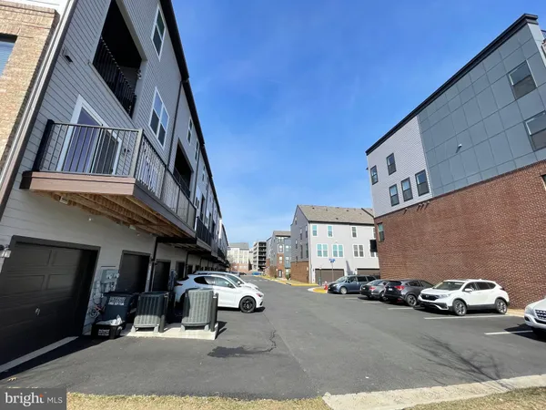 a view of a street with cars