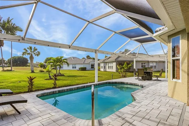 a view of walk in closet with clothes