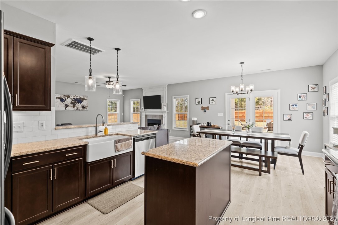 6438 Calloway Road Aberdeen, NC 28315 - Photo 11 of 50 a large kitchen with lots of counter space