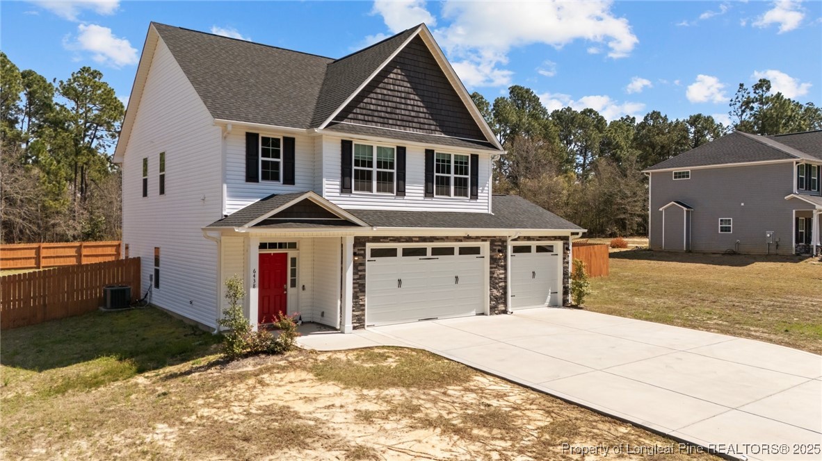 6438 Calloway Road Aberdeen, NC 28315 - Photo 2 of 50 front view of a house with a yard