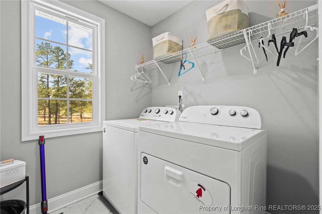 6438 Calloway Road Aberdeen, NC 28315 - Photo 23 of 50 a utility room with dryer and washer