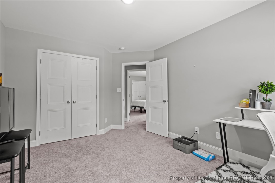 6438 Calloway Road Aberdeen, NC 28315 - Photo 24 of 50 a view of a room with workspace and a window