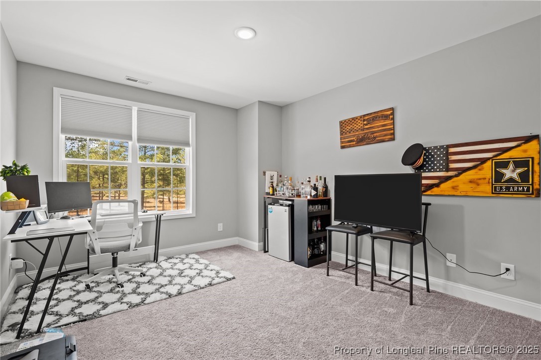 6438 Calloway Road Aberdeen, NC 28315 - Photo 25 of 50 a workspace with furniture and window