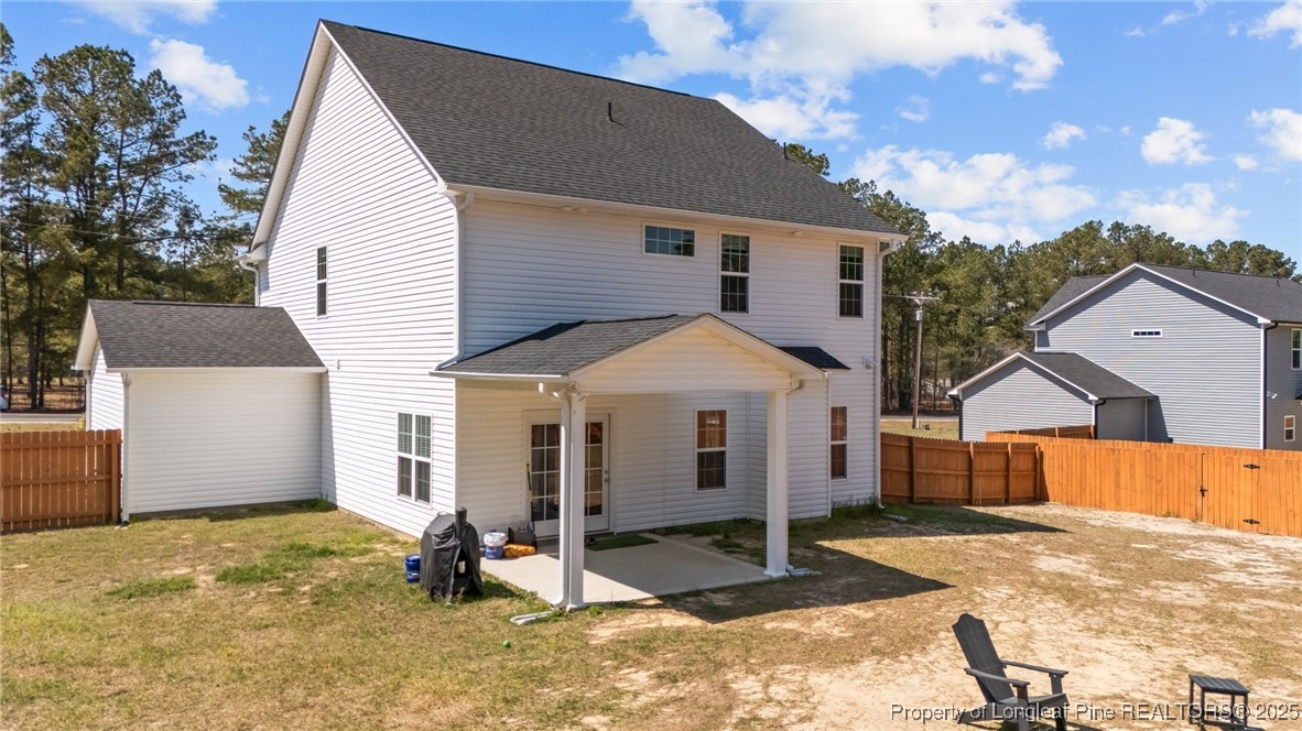 6438 Calloway Road Aberdeen, NC 28315 - Photo 36 of 50 a view of a house with a yard