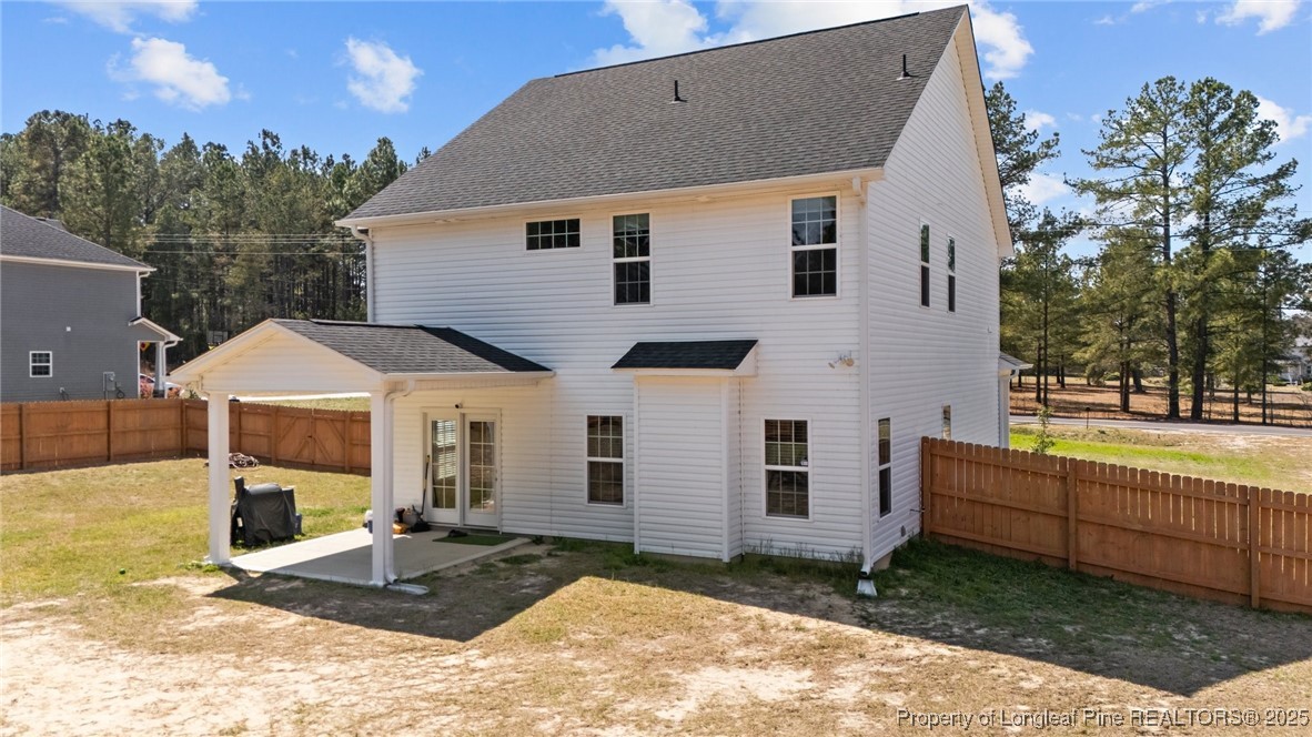 6438 Calloway Road Aberdeen, NC 28315 - Photo 39 of 50 a view of a house with backyard and sitting area