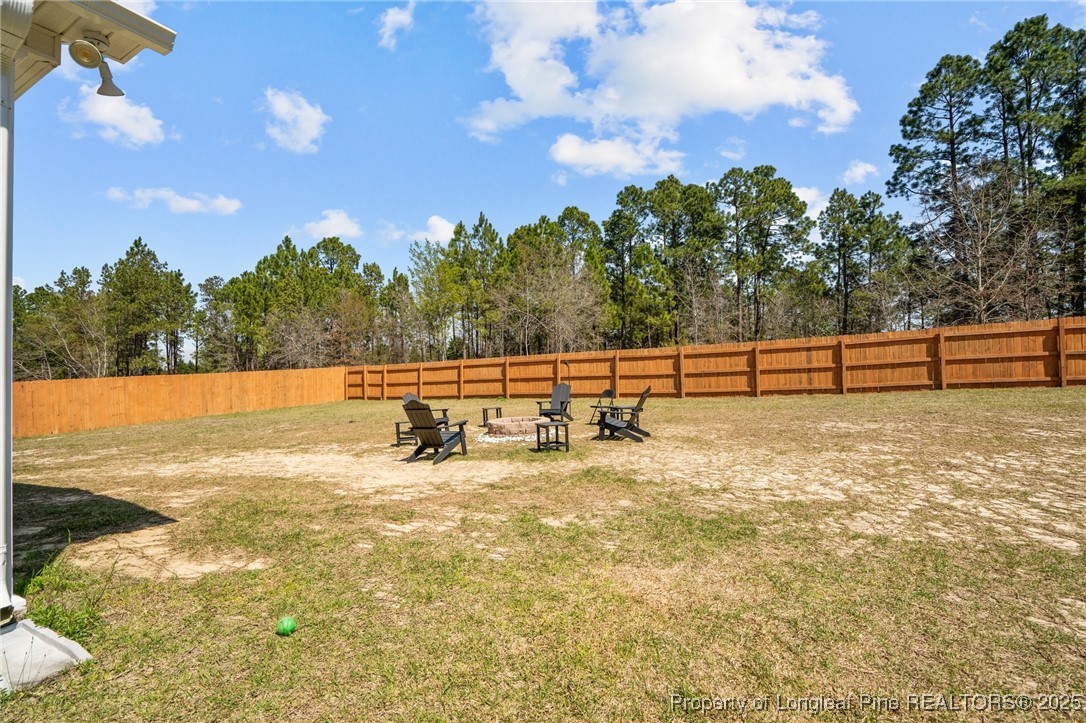 6438 Calloway Road Aberdeen, NC 28315 - Photo 45 of 50 a view of a lake with outdoor space