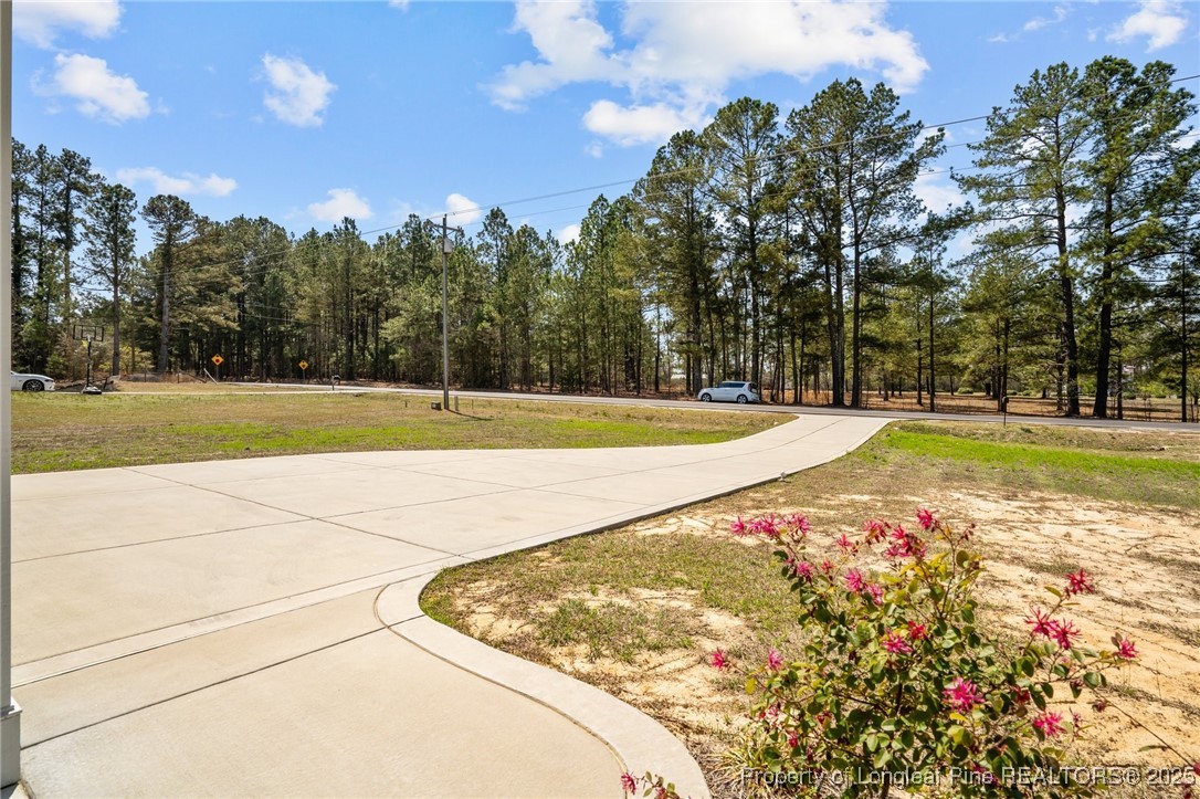 6438 Calloway Road Aberdeen, NC 28315 - Photo 5 of 50 a view of an outdoor space and tennis court