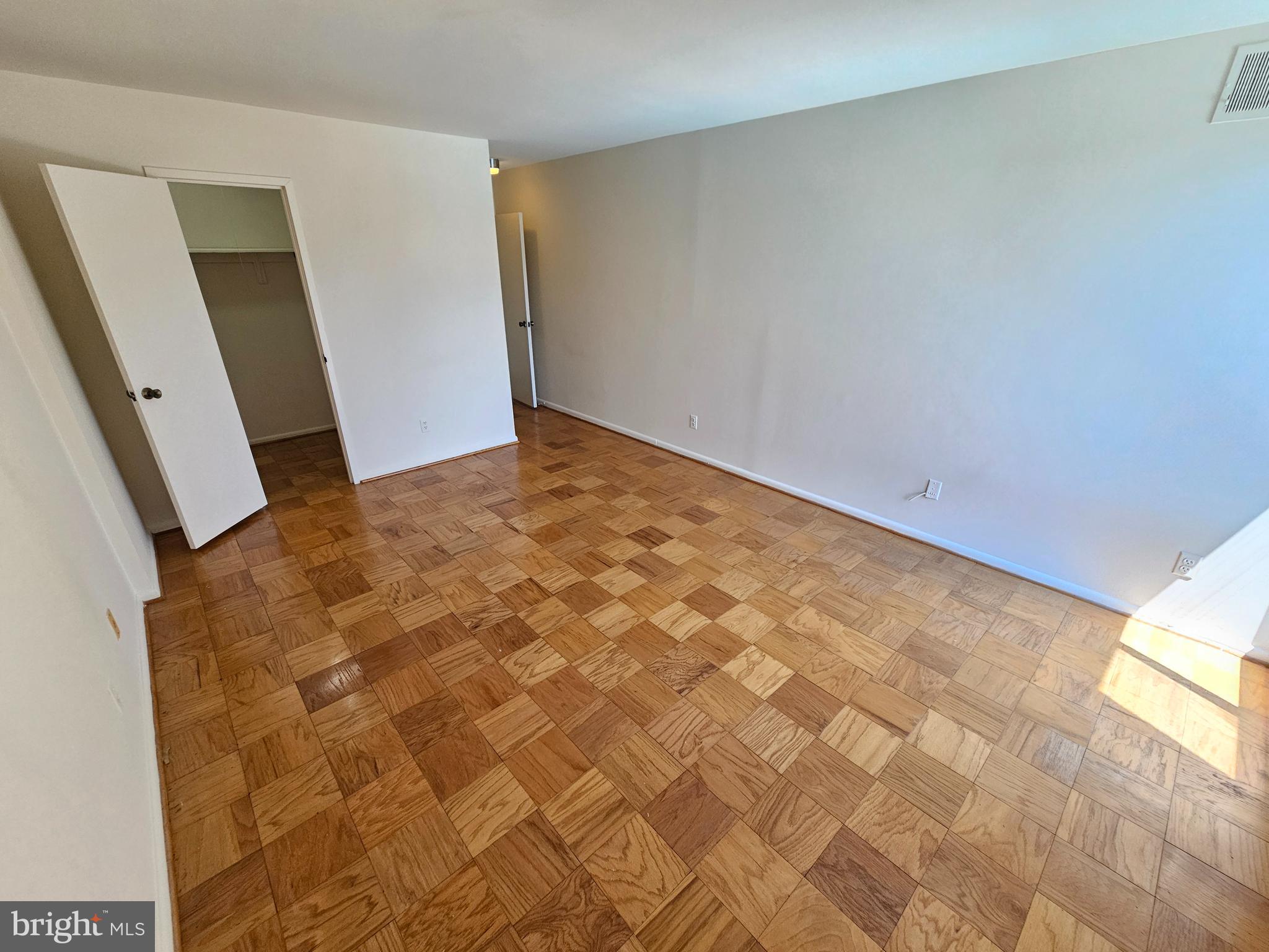 9900 Georgia Avenue, Unit 310 Silver Spring, MD 20902 - Photo 26 of 30 Primary Bedroom