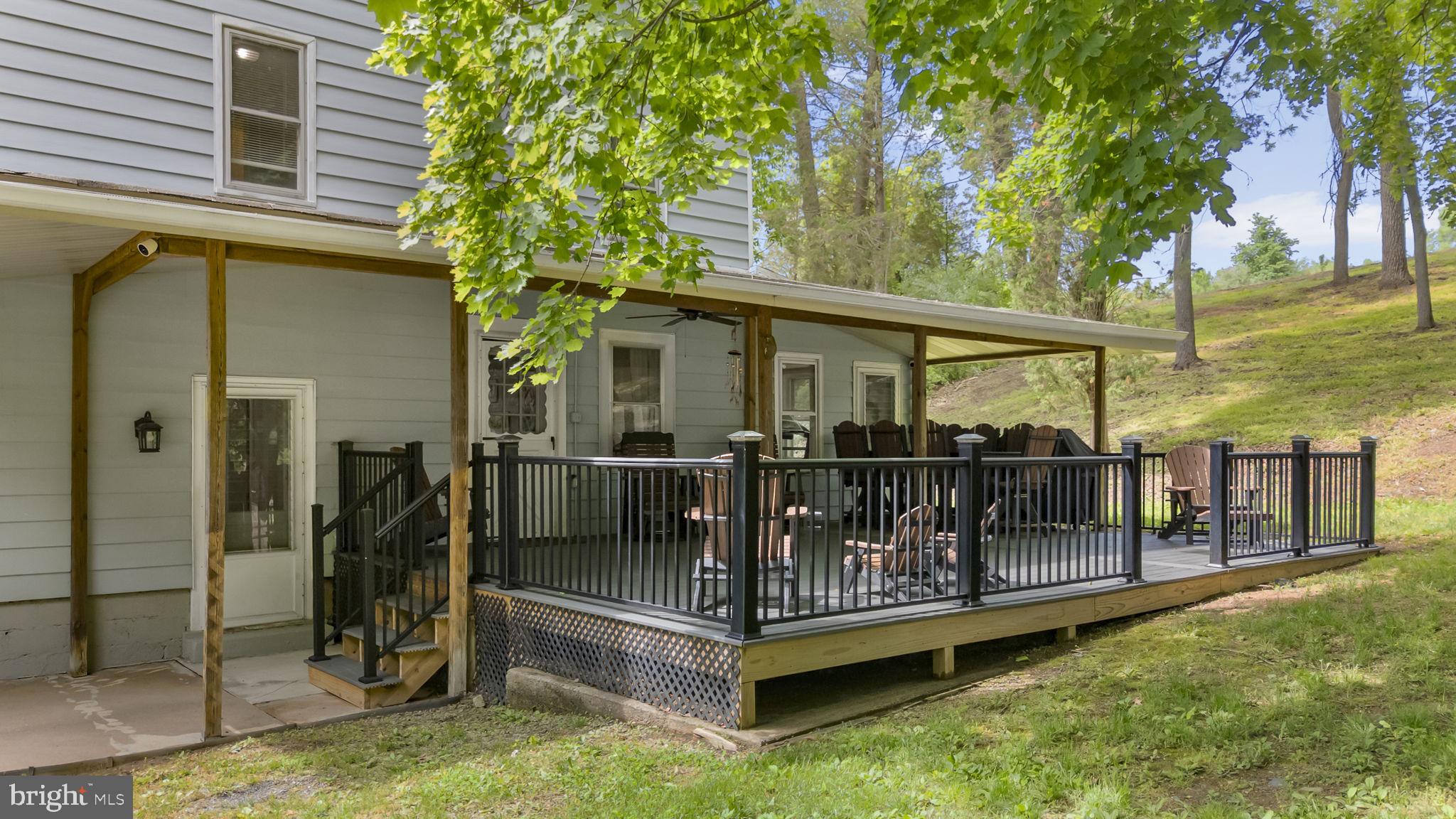 111 Garfield Road Leesport, PA 19533 - Photo 4 of 46 Charming deck nestled in nature's embrace.