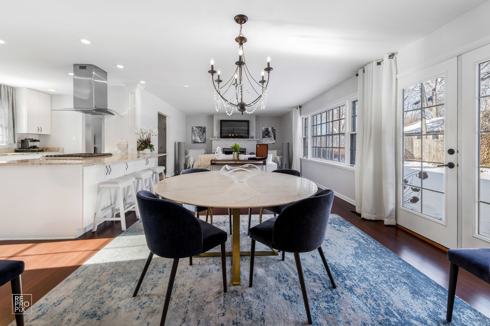 409 Bridle Lane Wheaton, IL 60187 - Photo 4 of 10 a view of a dining room with furniture window and wooden floor