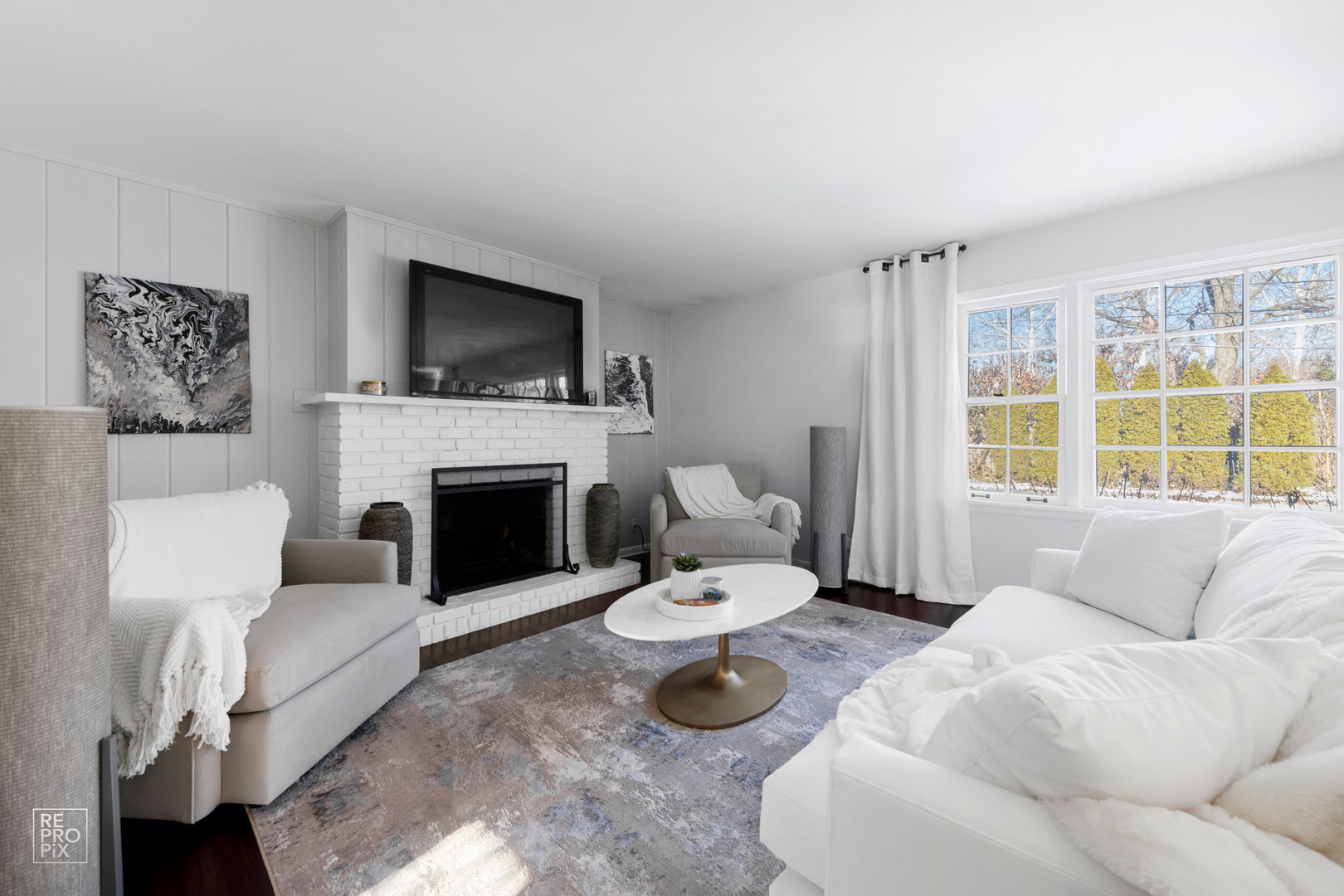 409 Bridle Lane Wheaton, IL 60187 - Photo 5 of 10 a living room with furniture and a fireplace