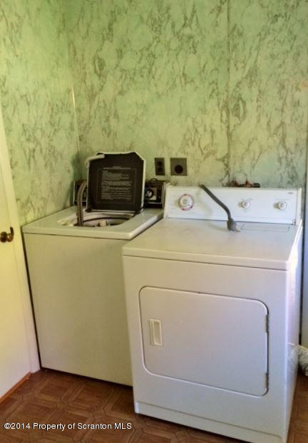 374 Maple Lake Road Moscow, PA 18444 - Photo 16 of 36 a utility room with dryer and washer