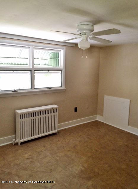 374 Maple Lake Road Moscow, PA 18444 - Photo 20 of 36 a view of an empty room with a window