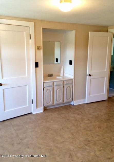374 Maple Lake Road Moscow, PA 18444 - Photo 22 of 36 view of room with window and hardwood