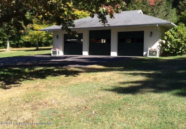 374 Maple Lake Road Moscow, PA 18444 - Photo 29 of 36 a view of a house with a swimming pool