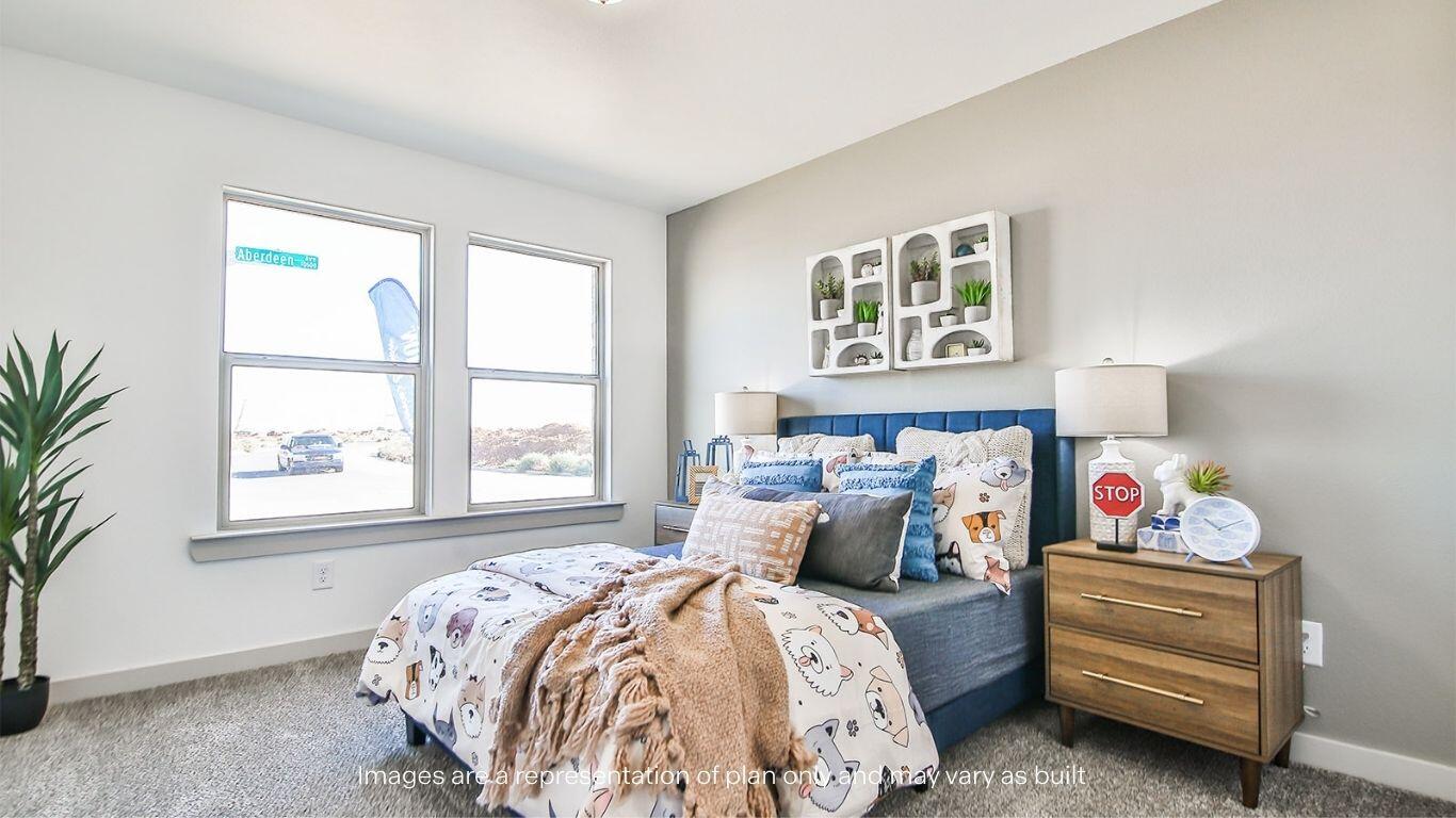 2921 138th Place Lubbock, TX 79423 - Photo 22 of 29 a bedroom with bed and a window