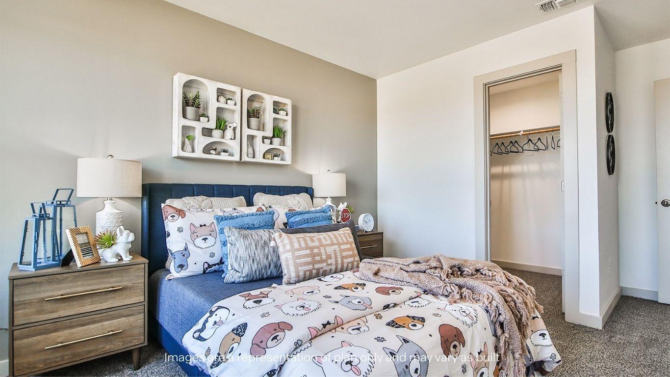 2921 138th Place Lubbock, TX 79423 - Photo 23 of 29 a bedroom with bed and a window