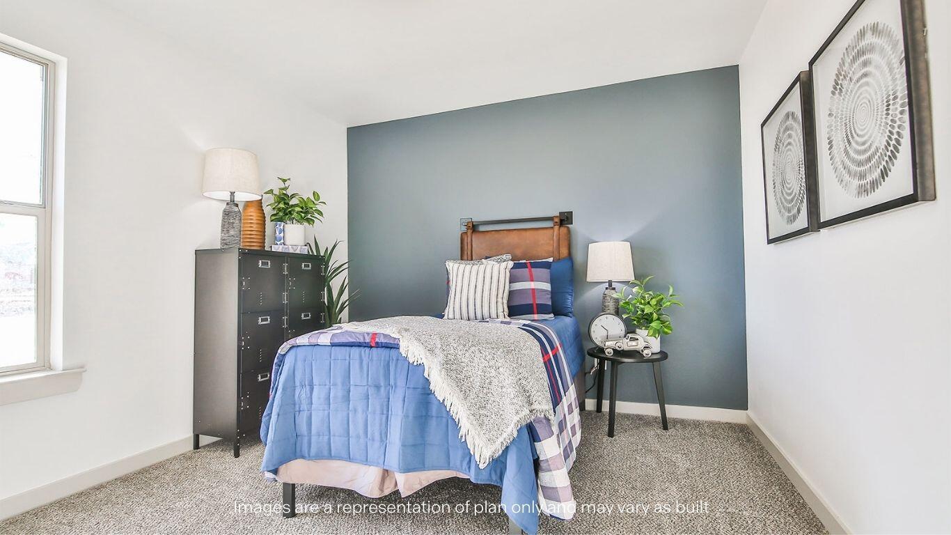 2921 138th Place Lubbock, TX 79423 - Photo 26 of 29 a bed room with furniture and wooden floor