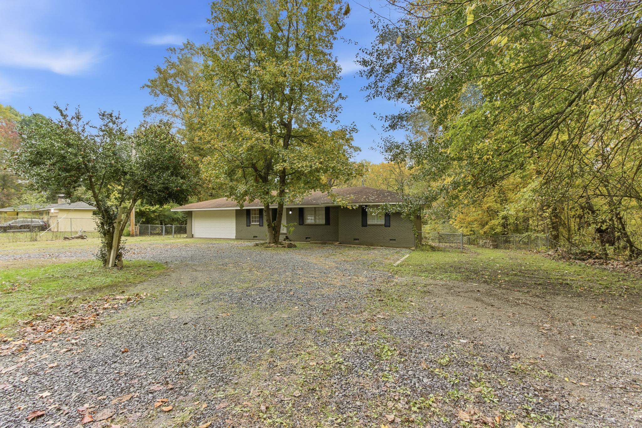 5002 Benjestown Road Memphis, TN 38127 - Photo 29 of 29 Ranch-style home featuring gravel driveway and crawl space