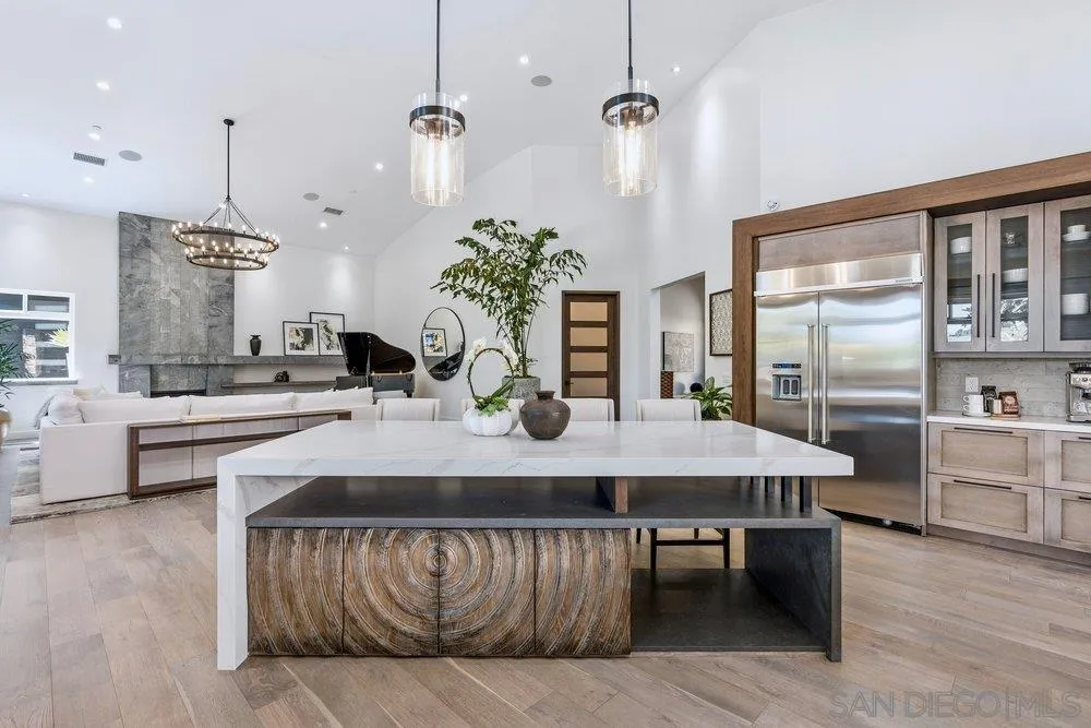 1240 Berryman Canyon Encinitas, CA 92024 - Photo 1 of 1 a kitchen with a table and chairs in it