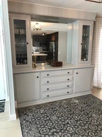 a view of a sink and a mirror