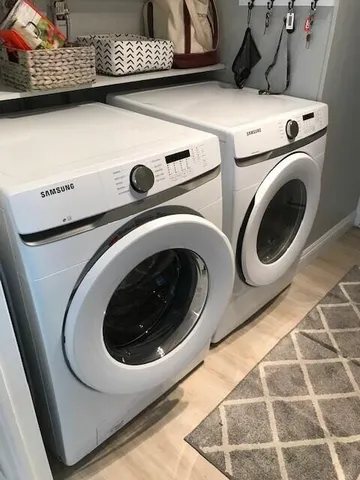 a utility room with dryer and washer