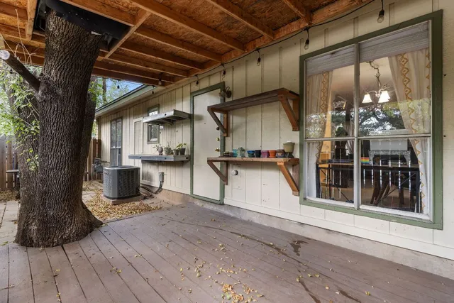 a view of a living room with a wooden floor