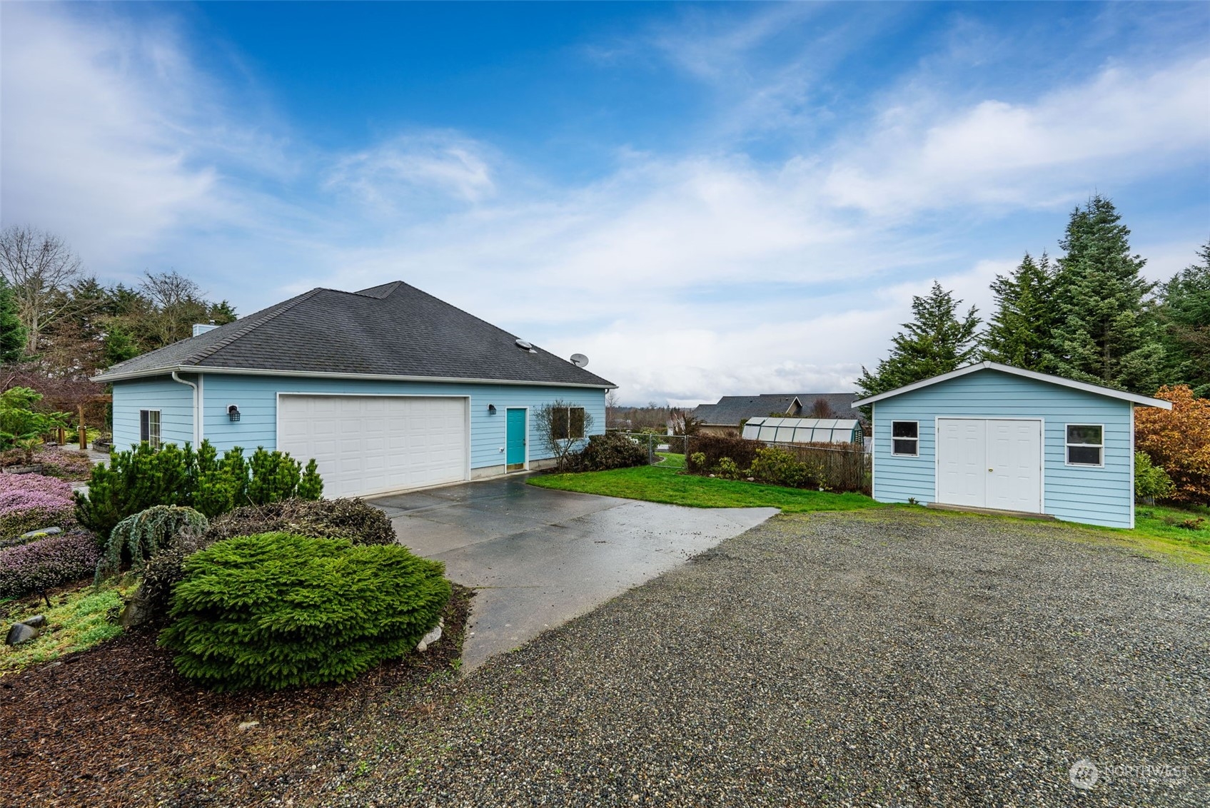 2143 Atterberry Road Sequim, WA 98382 - Photo 3 of 37 a view of a house with a yard and large tree