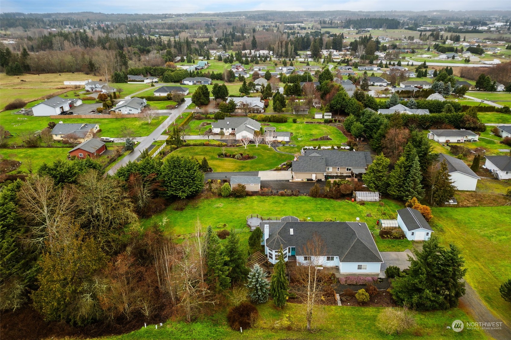 2143 Atterberry Road Sequim, WA 98382 - Photo 34 of 37 an aerial view of residential houses with outdoor space