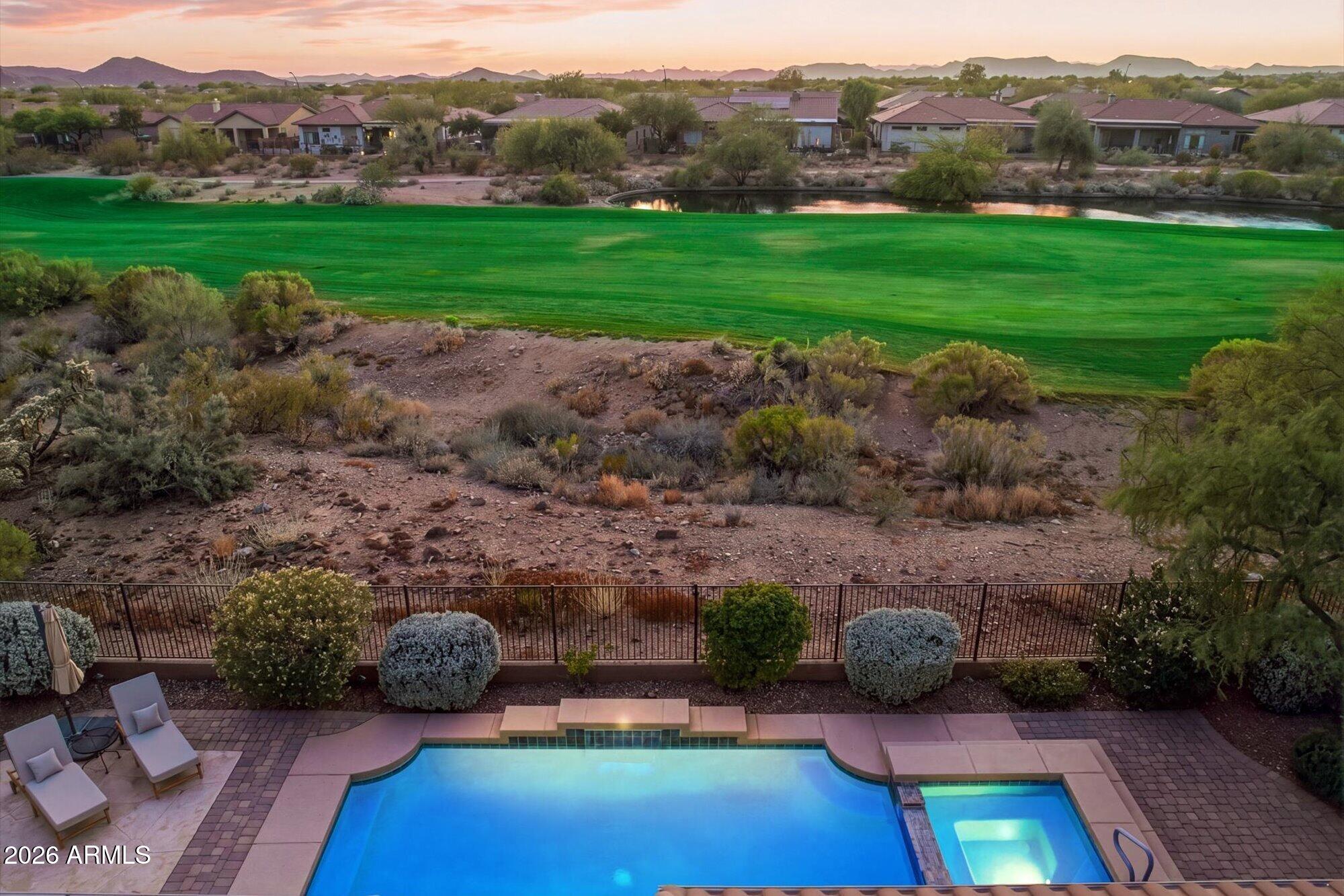 40322 North Hawk Ridge Trail Anthem, AZ 85086 - Photo 52 of 63 a view of a backyard with lawn furniture