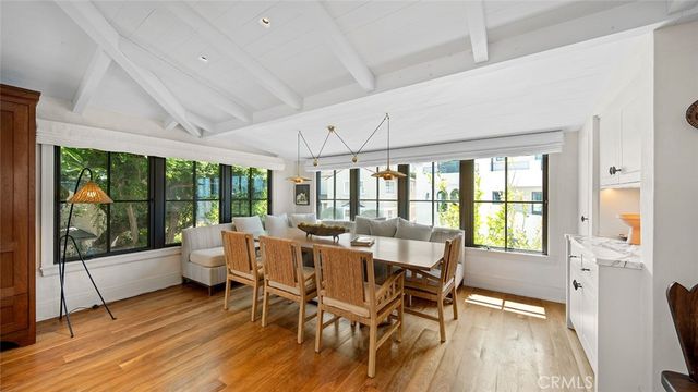 a spacious bedroom with a large bed and a window