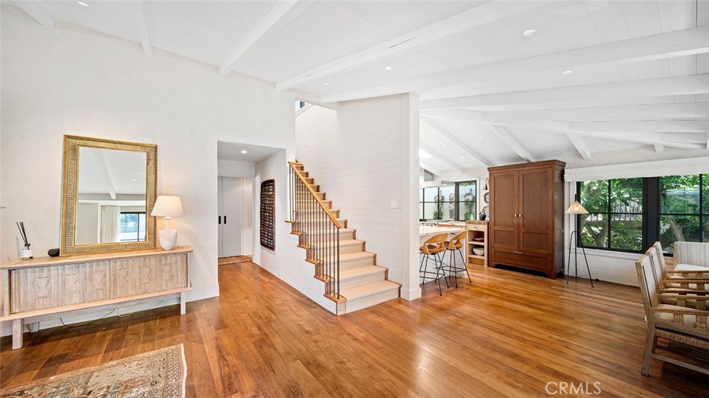 27 Emerald Bay Laguna Beach, CA 92651 - Photo 25 of 47 a view of an empty room with wooden floor and a window