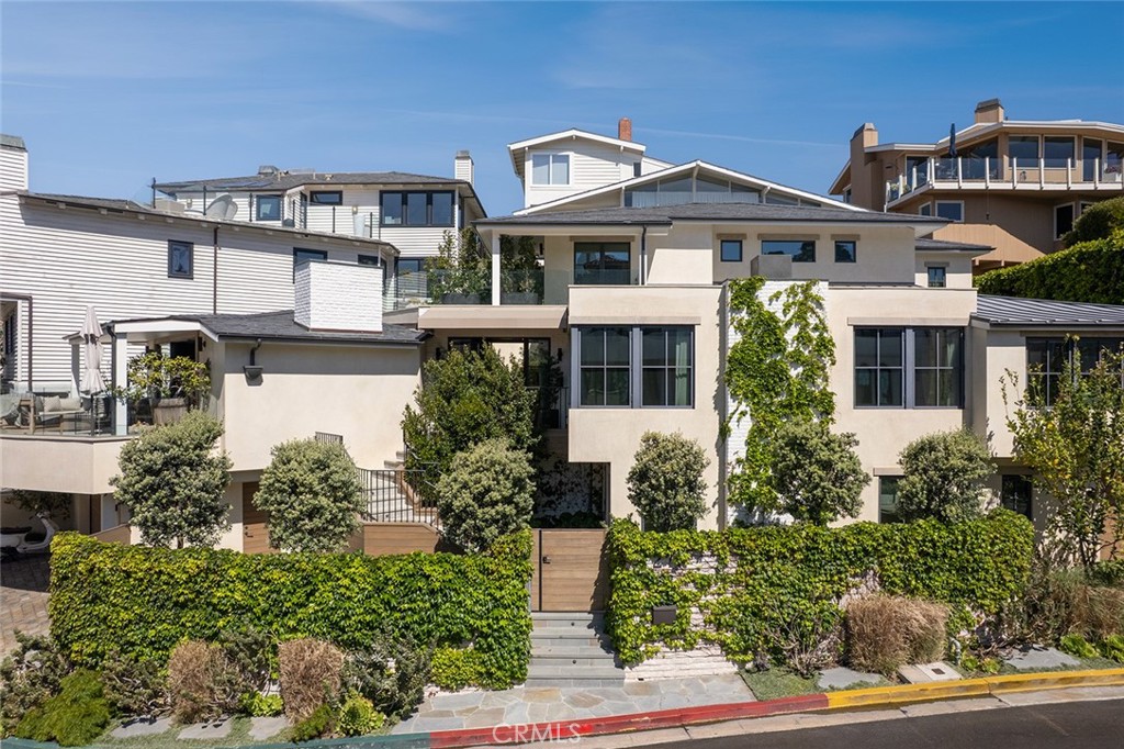 27 Emerald Bay Laguna Beach, CA 92651 - Photo 3 of 47 front view of a house with a yard