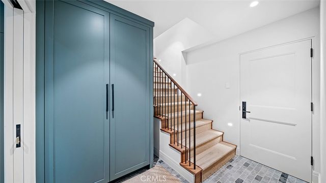 a utility room with sink dryer and washer