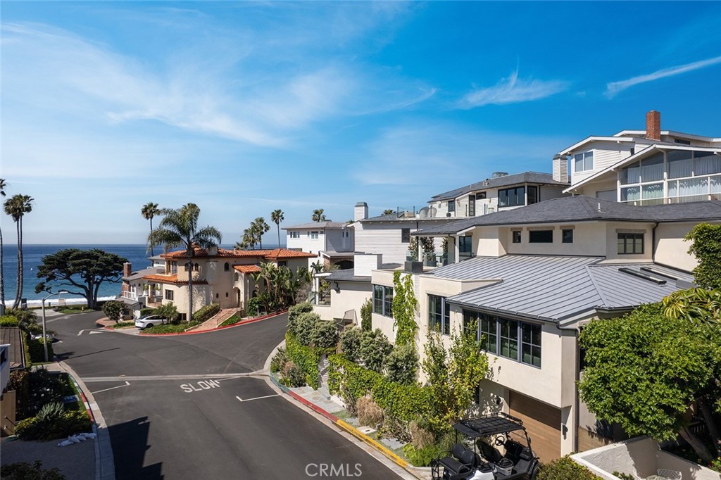 27 Emerald Bay Laguna Beach, CA 92651 - Photo 5 of 47 a aerial view of a house with a garden and balcony