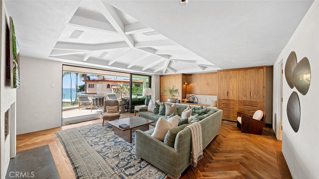 27 Emerald Bay Laguna Beach, CA 92651 - Photo 7 of 47 a living room with furniture and a large window