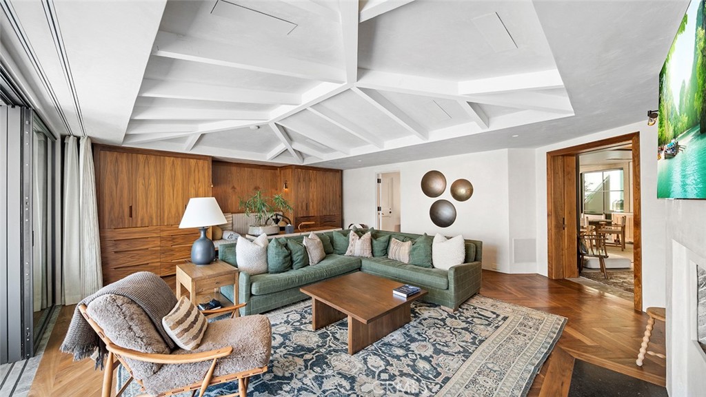 27 Emerald Bay Laguna Beach, CA 92651 - Photo 9 of 47 a living room with furniture and a large window