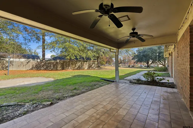 a view of swimming pool with a yard and outdoor seating