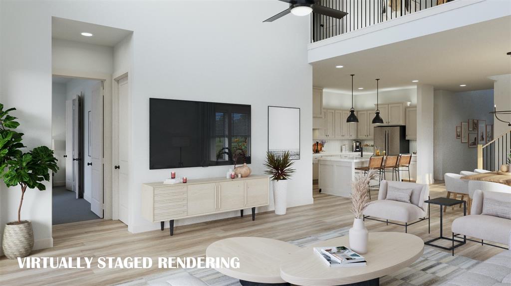 8943 Battlement Road Frisco, TX 75035 - Photo 6 of 16 a living room with furniture and a flat screen tv