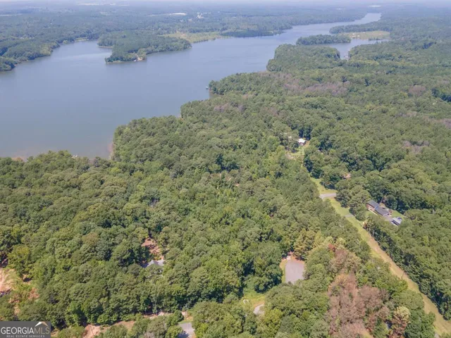 an aerial view of a houses with outdoor space