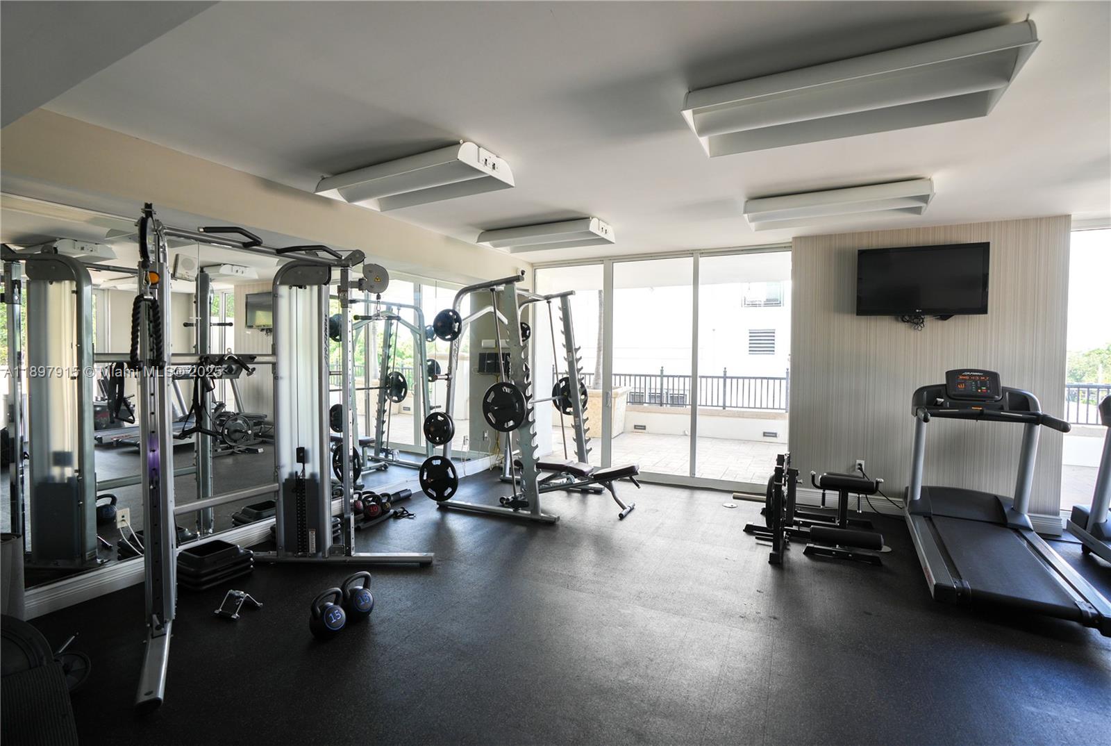 4100 Salzedo Street, Unit 916 Coral Gables, FL 33146 - Photo 17 of 24 a view of a room with gym equipment