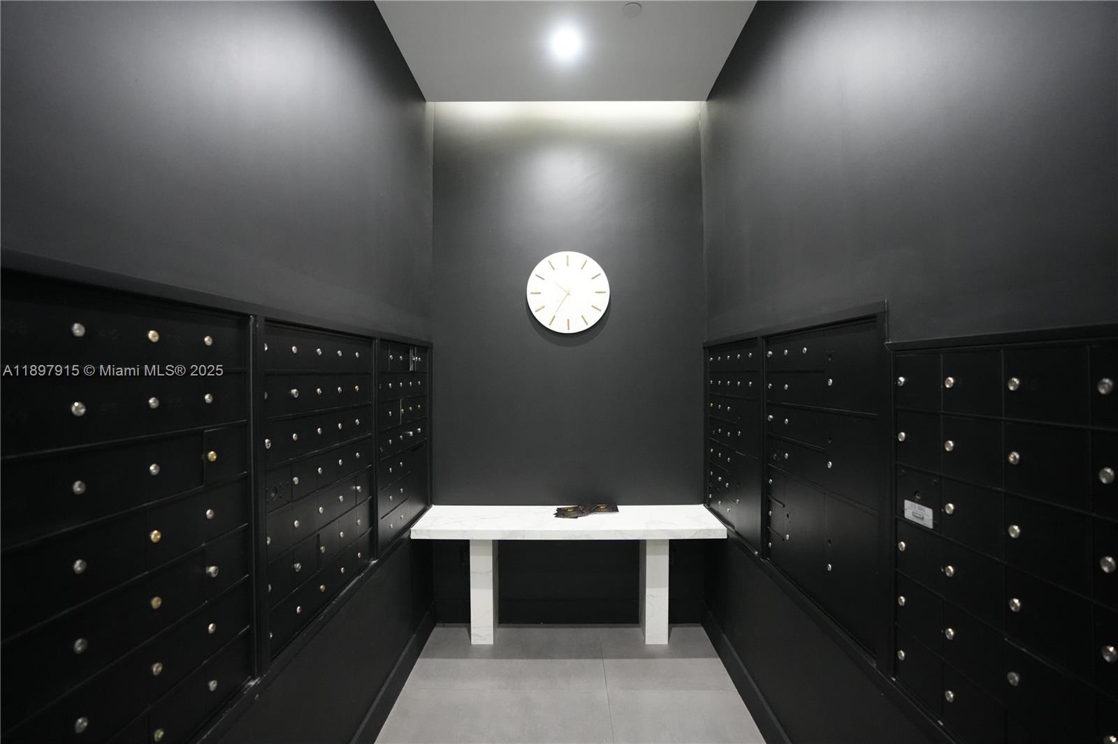 4100 Salzedo Street, Unit 916 Coral Gables, FL 33146 - Photo 20 of 24 a bathroom with a sink vanity and a mirror