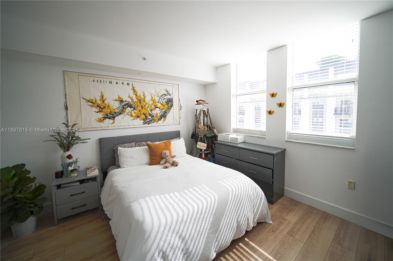 4100 Salzedo Street, Unit 916 Coral Gables, FL 33146 - Photo 5 of 24 a bedroom with a bed and a window