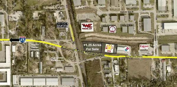 a street sign on a wall next to a building