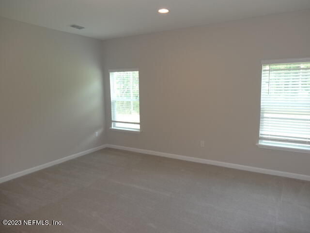 69 Trewin Circle St. Augustine, FL 32092 - Photo 20 of 36 an empty room with a window