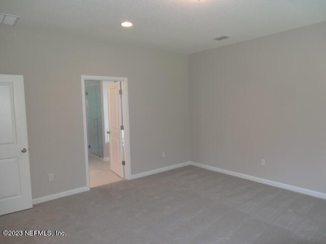 69 Trewin Circle St. Augustine, FL 32092 - Photo 21 of 36 a view of an empty room