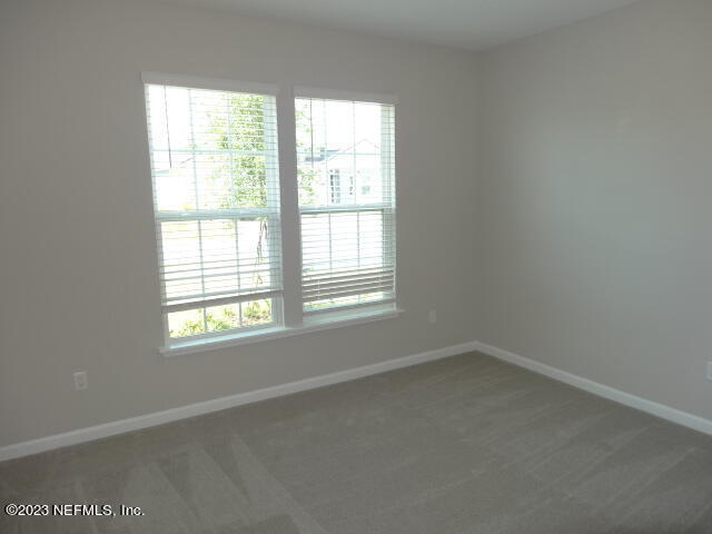 69 Trewin Circle St. Augustine, FL 32092 - Photo 24 of 36 an empty room with a window