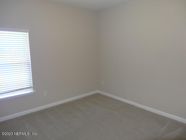 69 Trewin Circle St. Augustine, FL 32092 - Photo 26 of 36 a room that has a window
