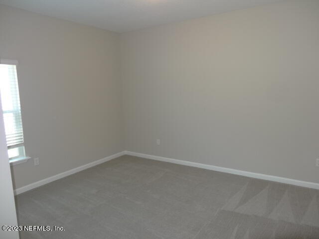 69 Trewin Circle St. Augustine, FL 32092 - Photo 28 of 36 a room that has a window in it