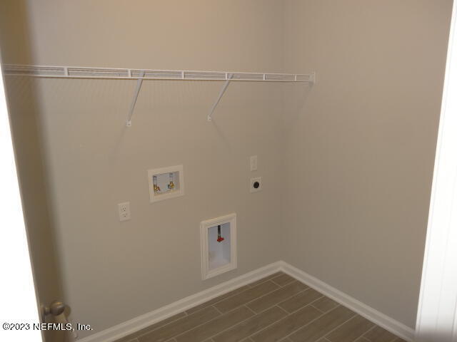 69 Trewin Circle St. Augustine, FL 32092 - Photo 29 of 36 a view of small space with racks on the wall